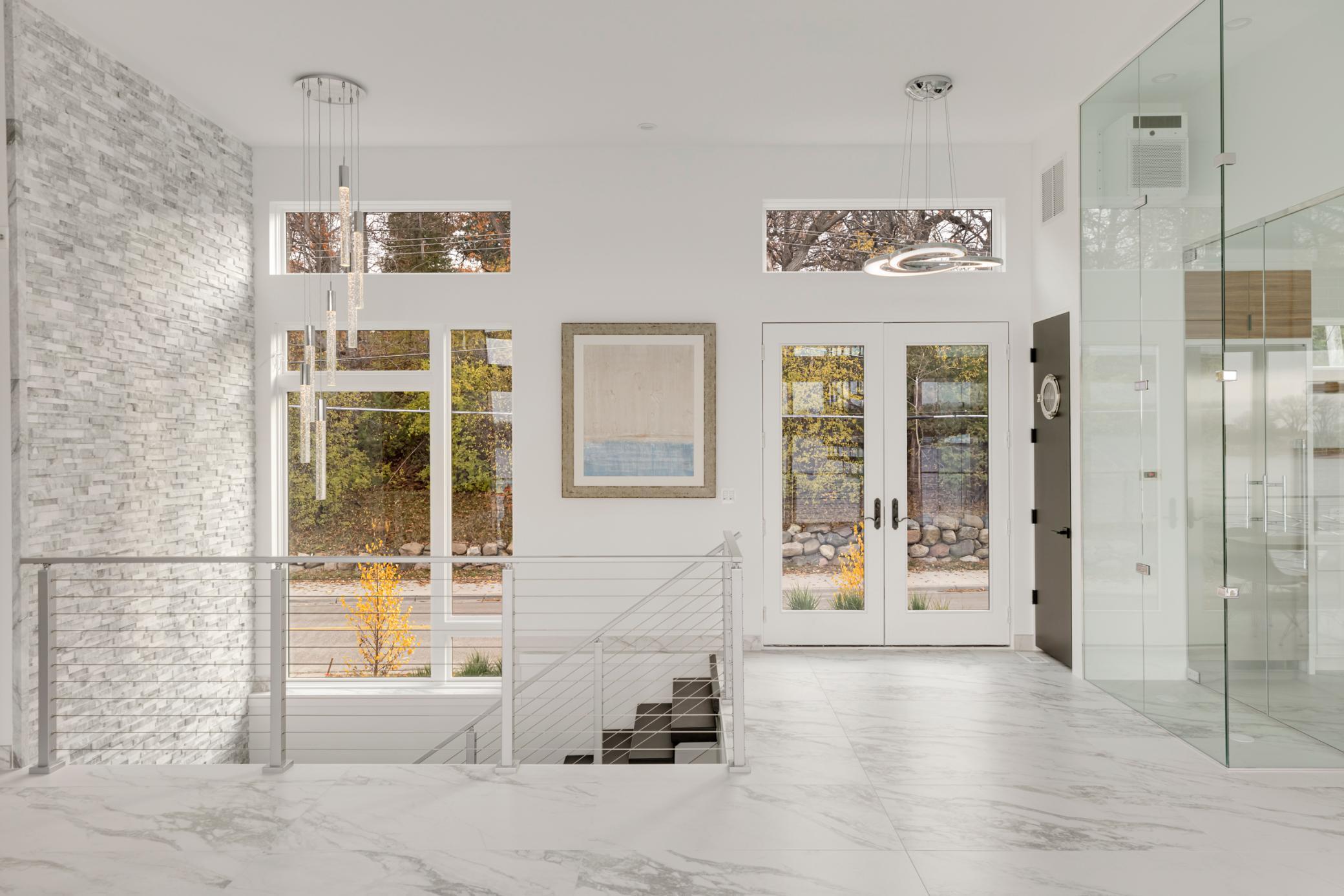 Come home to to this striking contemporary lakefront property.