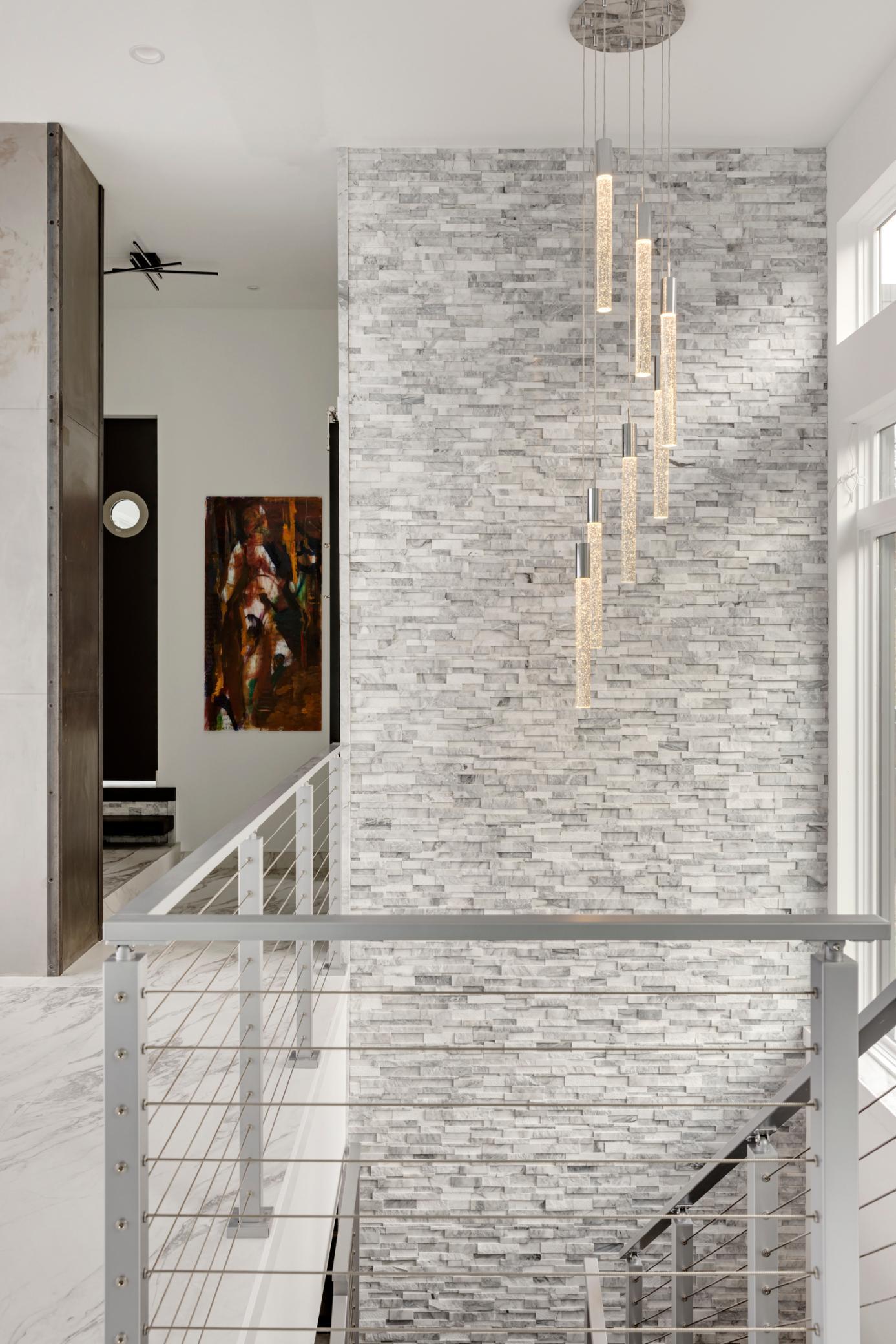 This home features graceful, yet modern light fixtures.