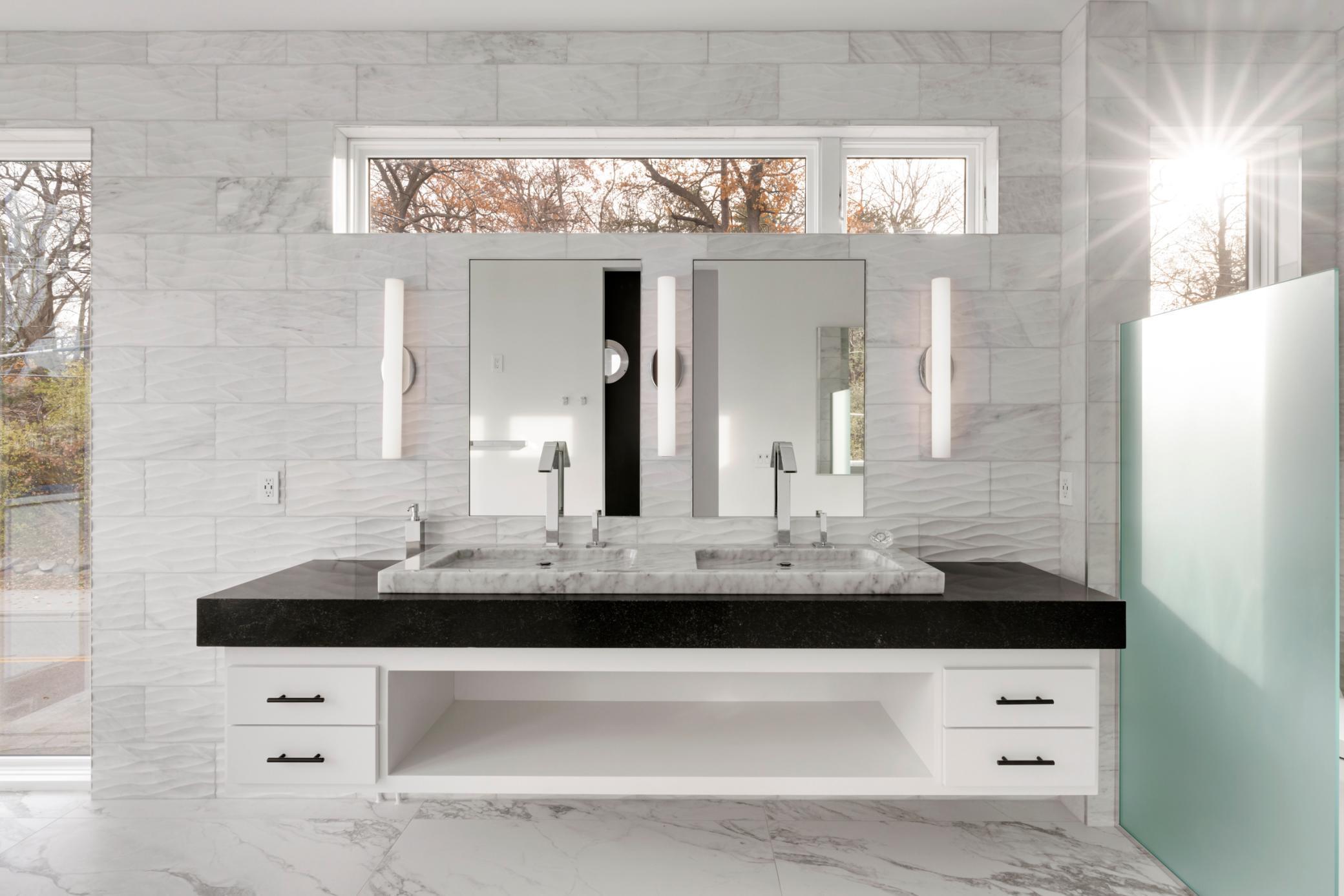 Enjoy heated towel racks and heated floors, along with dual sinks of course.