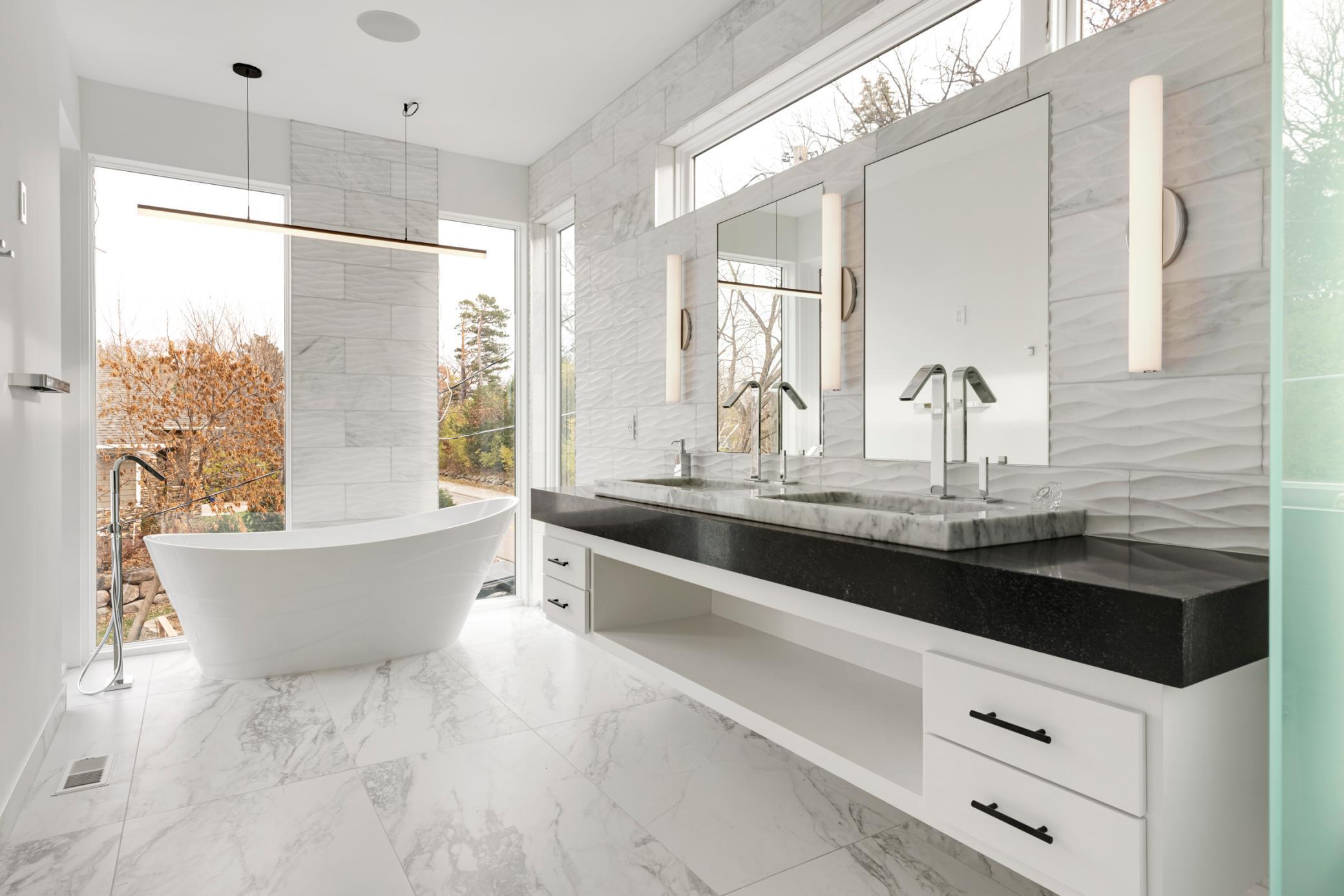 Relax in the tub overlooking the lake.