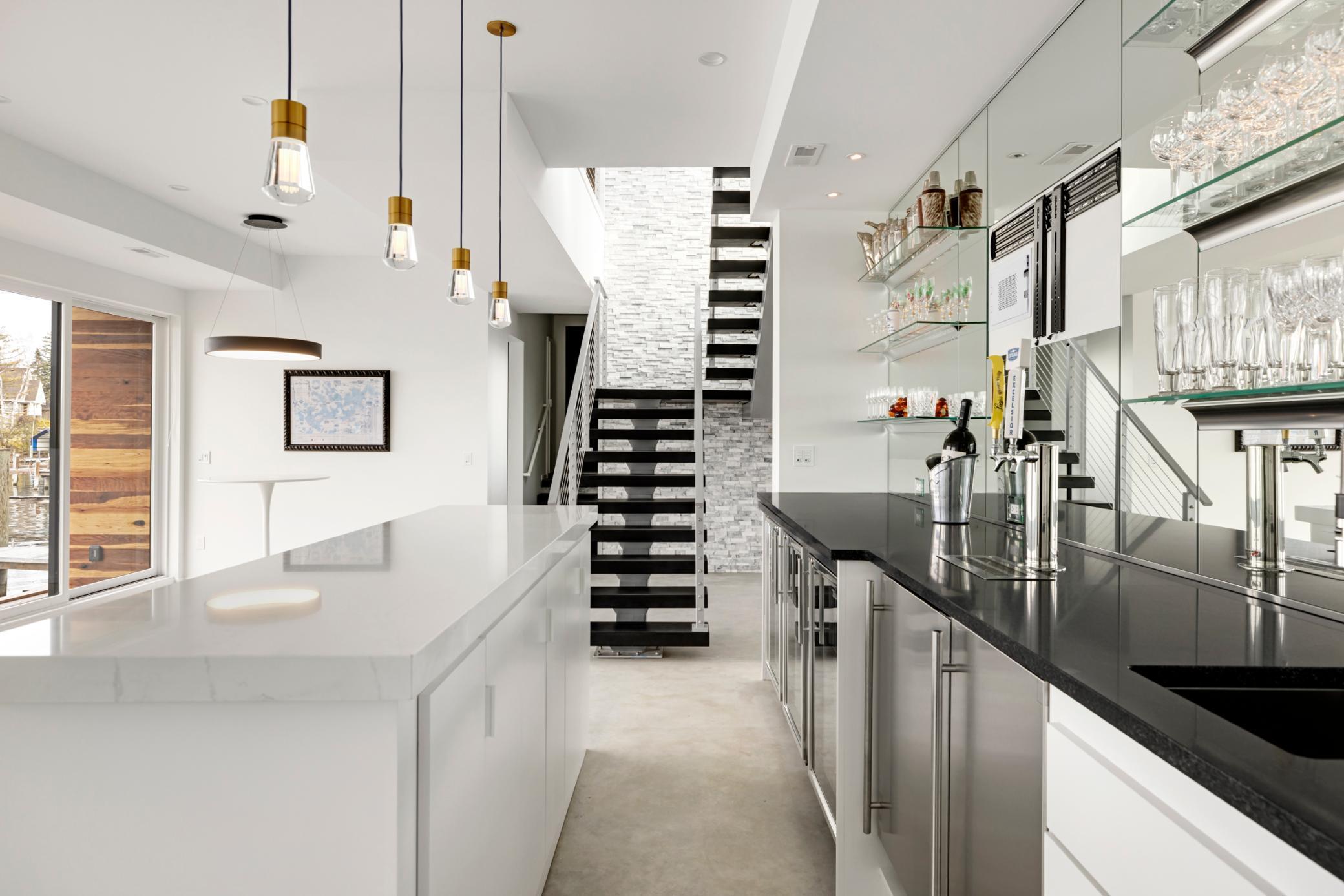 Kegerator anyone? Multiple refrigerators and an ice maker complete this bar.