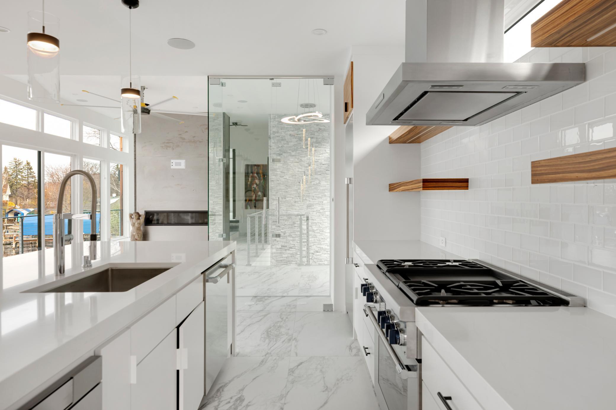 Show off your skills in the kitchen with the gas range and the grill just steps away.