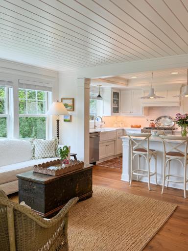 The bright nook space adjoins the kitchen creating a nice area to gather.