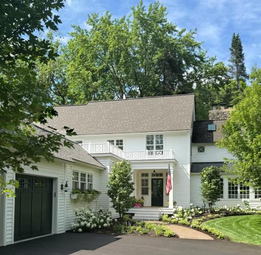 The property offers wonderful curb appeal in a gorgeous setting.