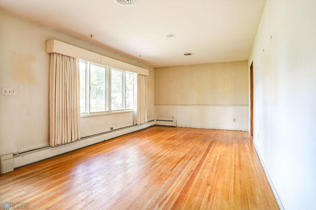 Newly uncovered hardwood floors throughout!