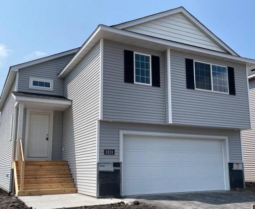 Home is at the final touch up stage and will be ready for move-in on 8-12-24! Featuring an Unfinished Walkout Lower Level ready for future finish. Stone accents, landscaping, irrigation system, and sod will be installed soon.