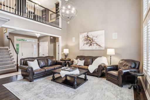 As you enter, your eyes are naturally drawn to soaring vaulted ceilings that add architectural splendor to the space.
