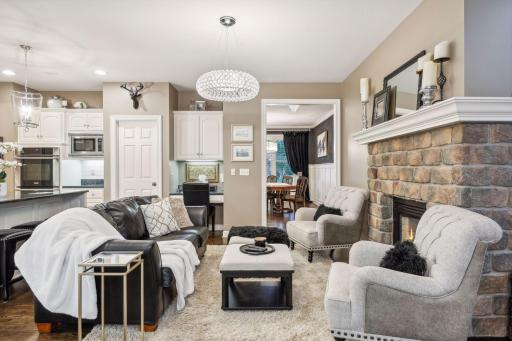 Nestled between the gourmet kitchen and the sunroom, the sitting room offers a cozy and intimate retreat within this beautifully designed home.