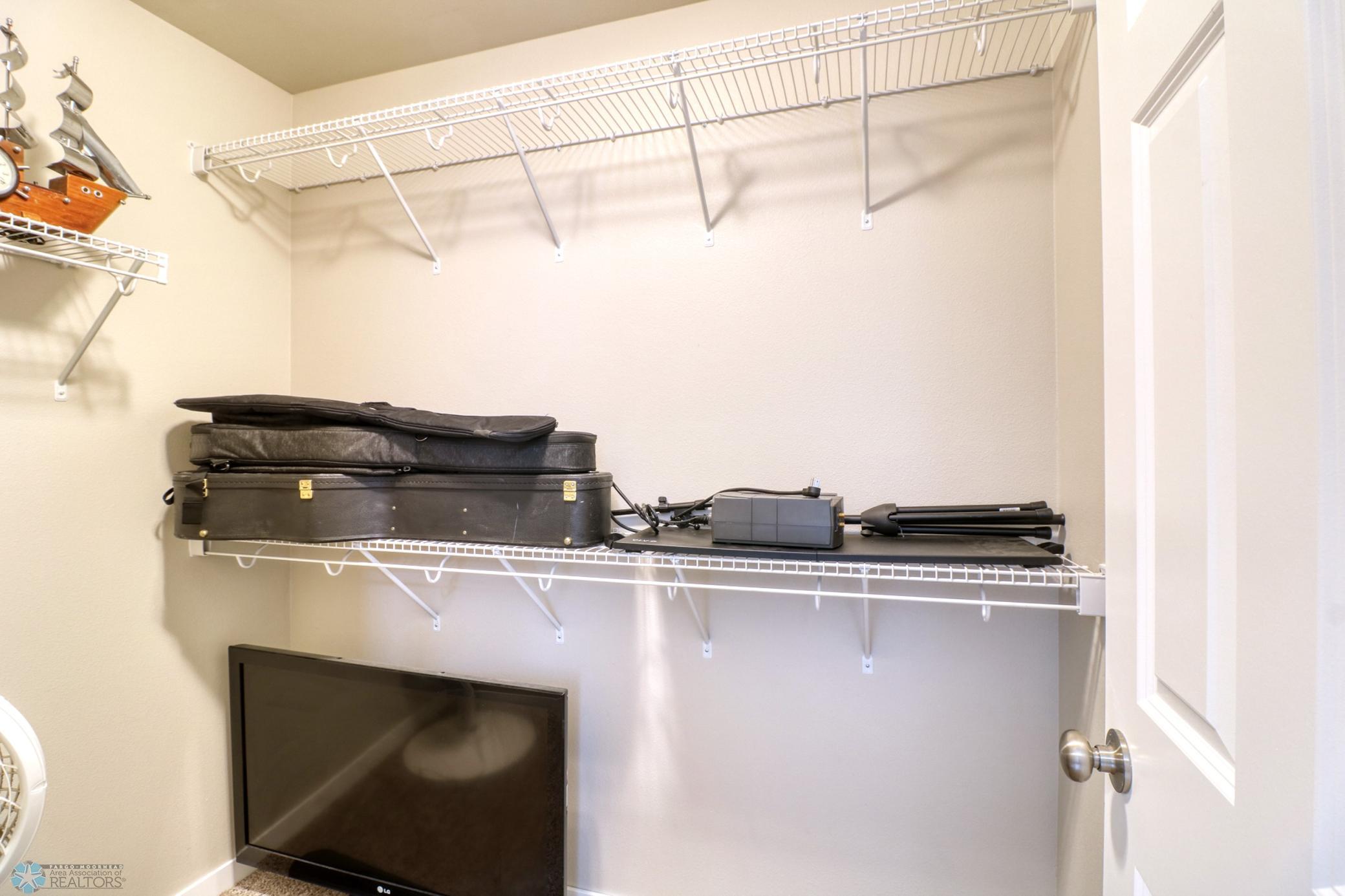 BOTH basement bedrooms have their own walk-in closet
