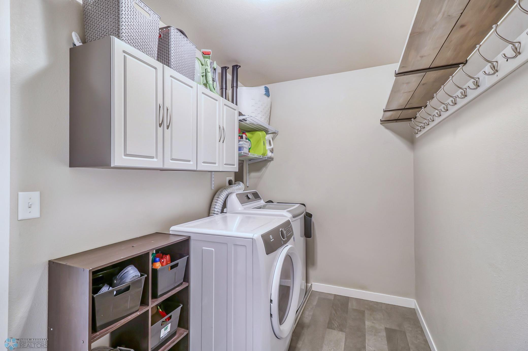 Convenient! Main floor laundry & drop zone