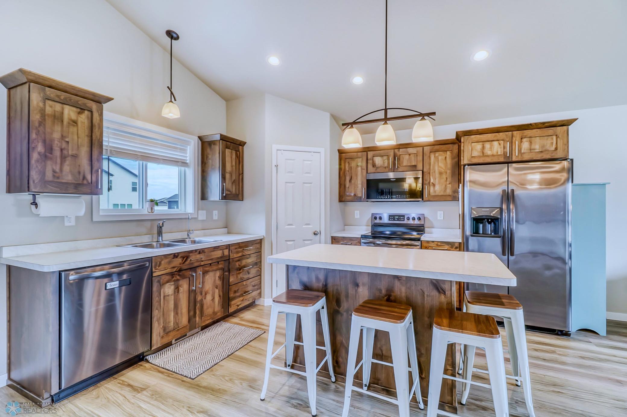 Kitchen with corner pantry & window above the sink