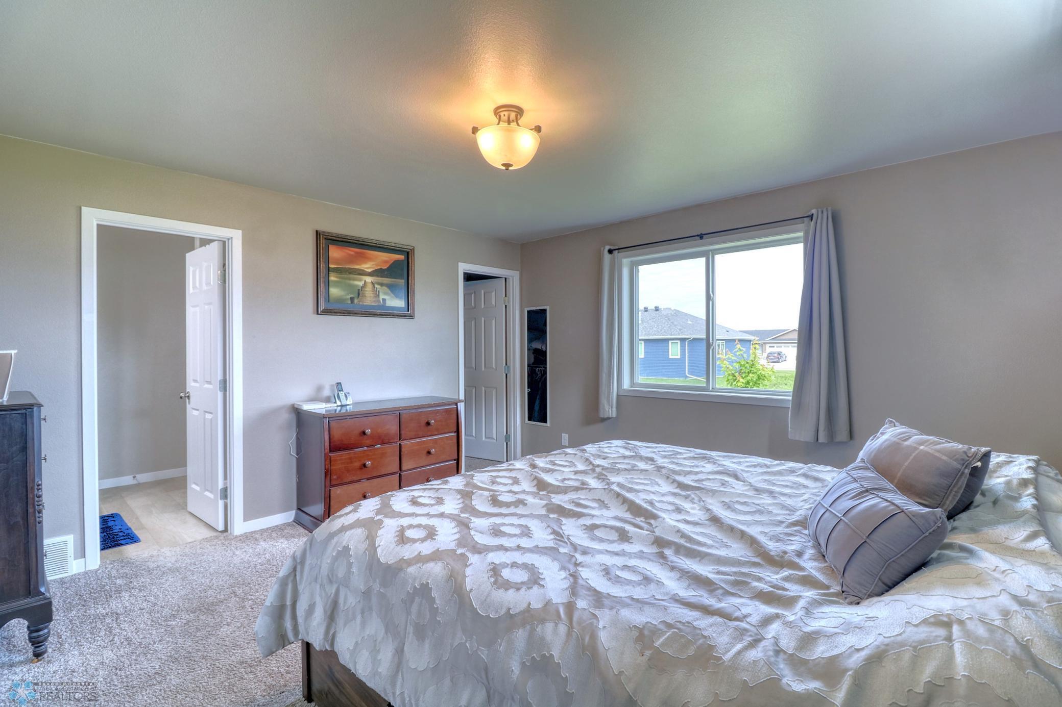 Primary Bedroom - walk-in closet & private bathroom