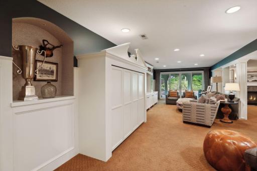 Built-in full-sized Murphy bed welcomes overnight guests.