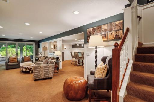 The lower level has a side walk-out offering easy access to the firepit and gazebo.