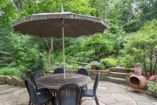 Enjoy seasonal dining and the lull of the waterfall on this beautiful stone patio.