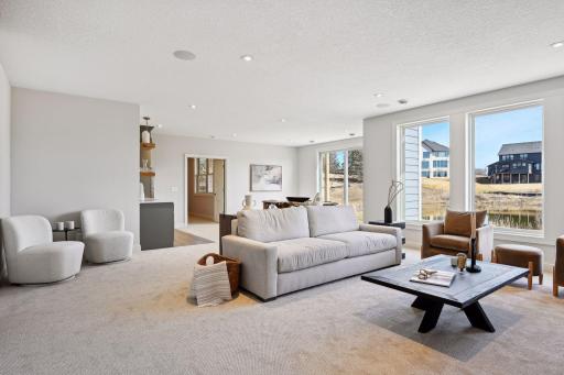 Lower-Level Family Room with Wet Bar & Game Area *photo of like home
