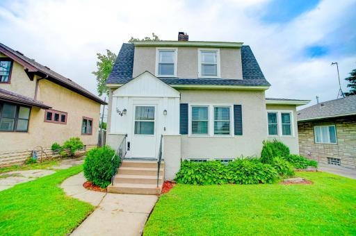 Situated near Como Park you will find this delightful Dutch Colonial. Roof Replaced in 2022