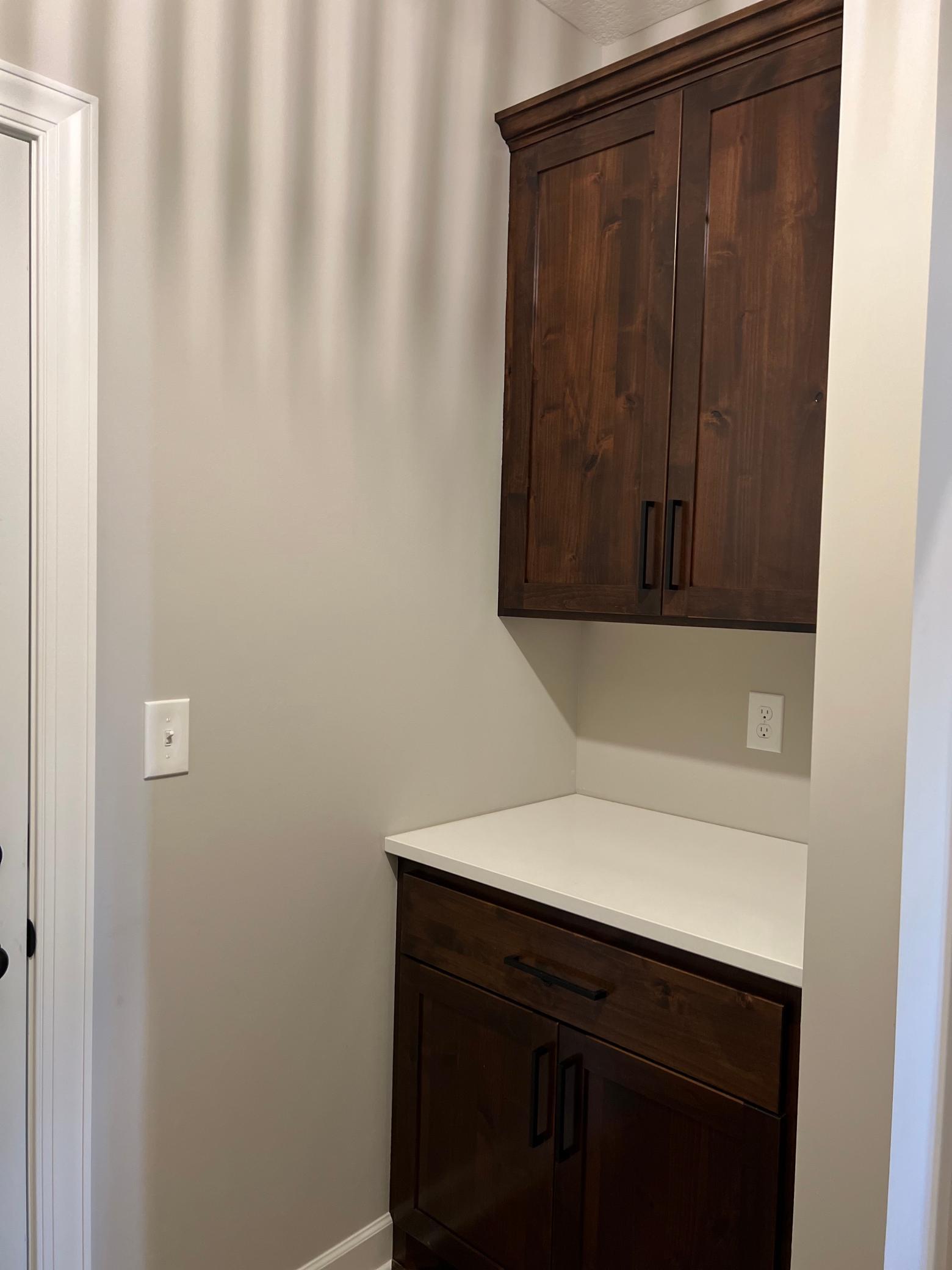Mud room with drop station off garage