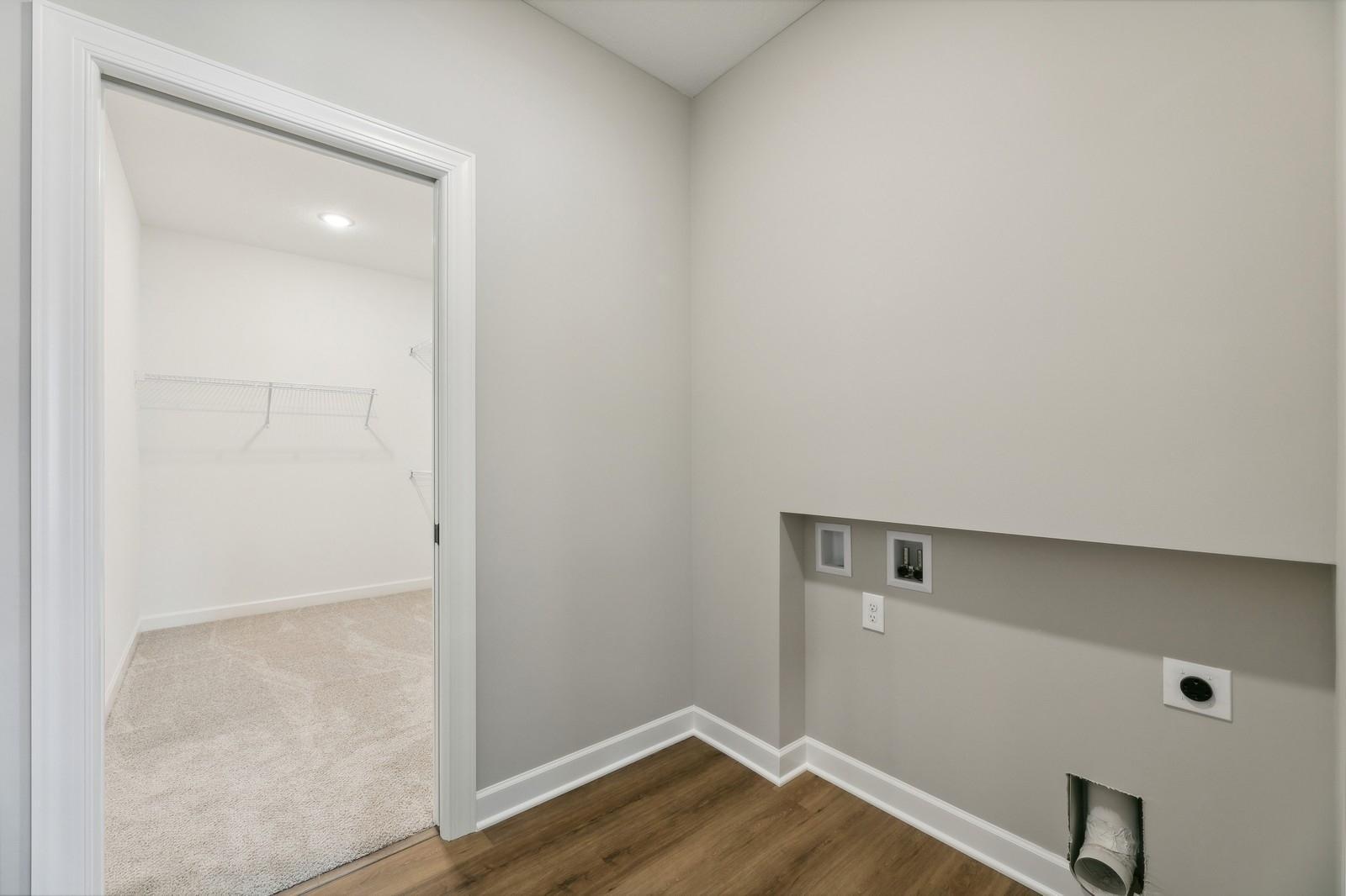 Laundry room off of master closet