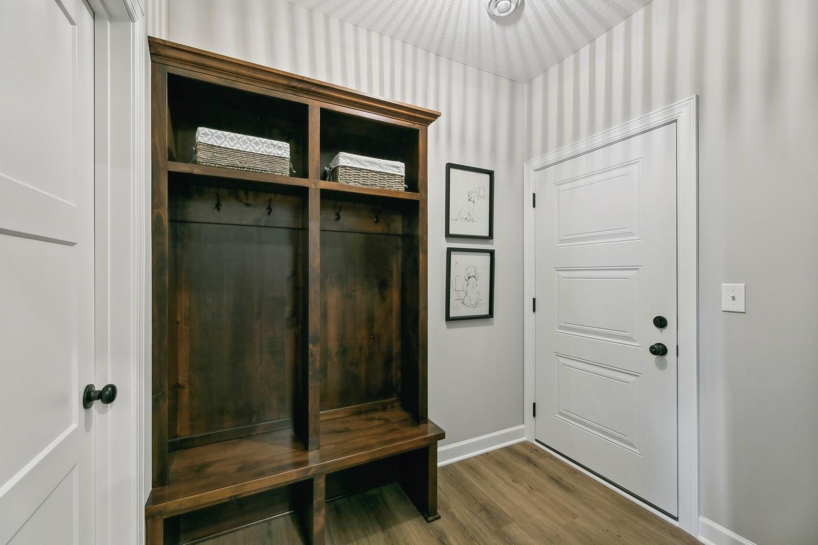 Custom lockers in mudroom off of garage