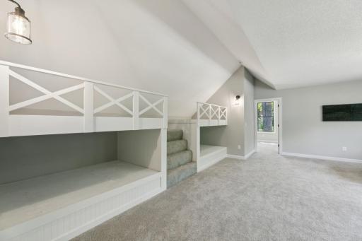 Full size built-in bunks in bonus room above garage
