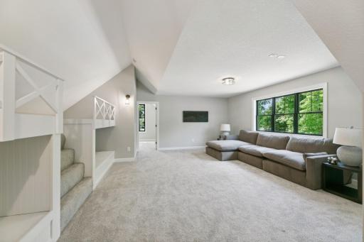 Bonus room above garage! Set up for a theater room