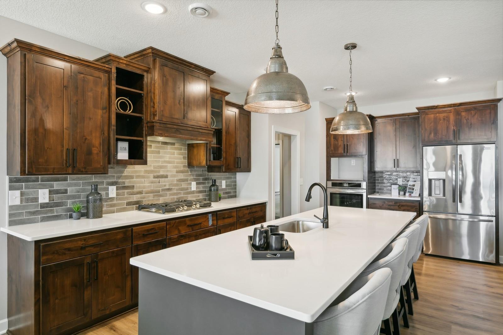 Custom cabinetry and stainless steel appliances in the kitchen!