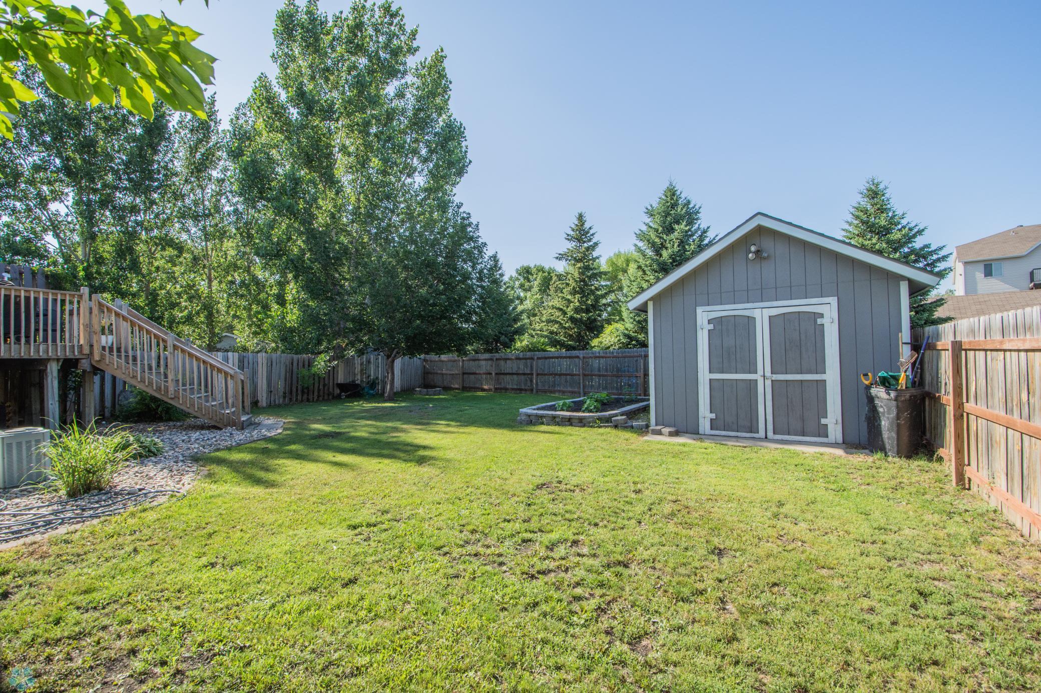 Fenced Yard w/ Shed & Garden