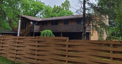 Large west facing deck overseeing the back yard