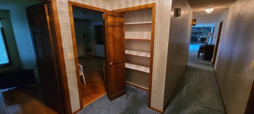 Closet at the end of the hallway, for more storage