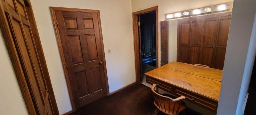 Dressing area with make-up mirror and desk