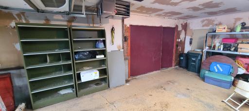 Shelving and entrance from garage into the house