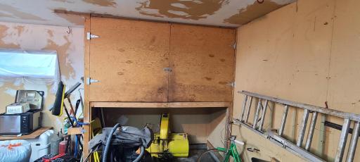 More storage areas in the corner of the garage