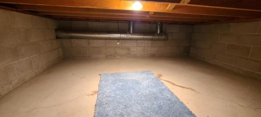 And the crawl space under the main entrance, giving us a look at the foundation walls