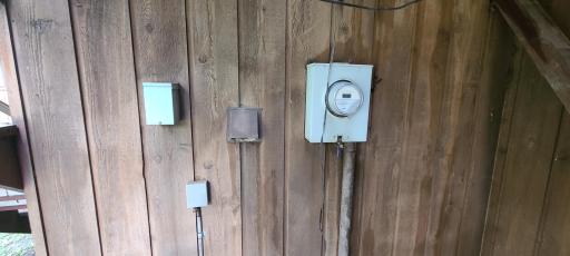 Electrical meter and box for generator hookup on the left