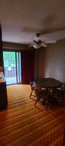 Informal dining area right beside the kitchen. With patio door accessing the rear deck
