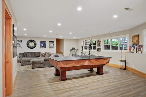 Daylight lookout windows, an abundance of recessed lighting and 8 foot ceilings keep this space feeling bright and open.