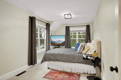 Fourth upper level bedroom also features a large walk in closet.