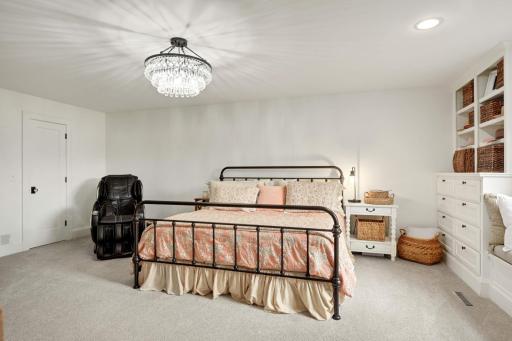 The primary suite measures almost 20 feet by 18 and has a custom designed walk in closet with full organizers.