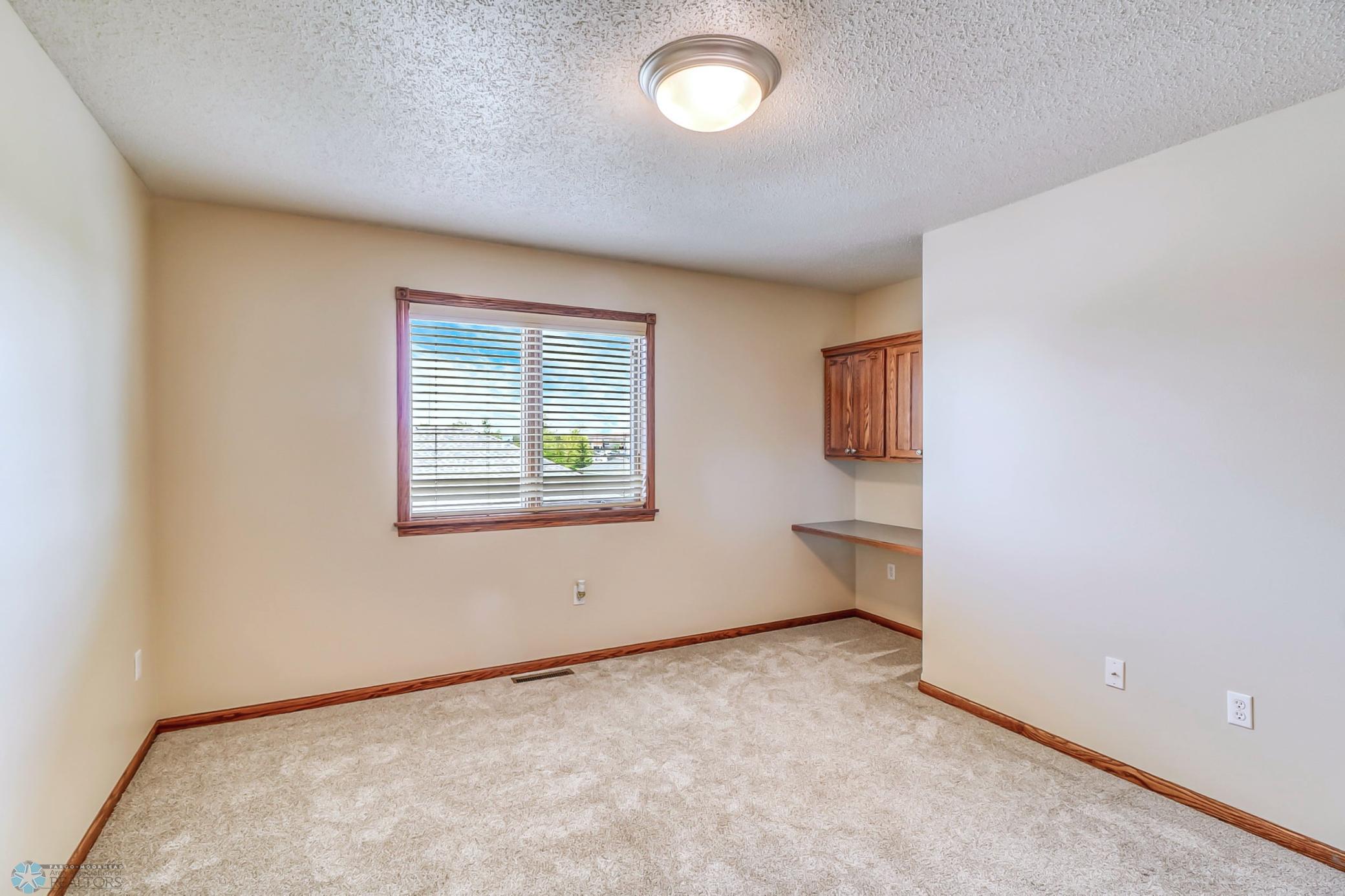3rd Upstairs Bedroom - with built-in desk
