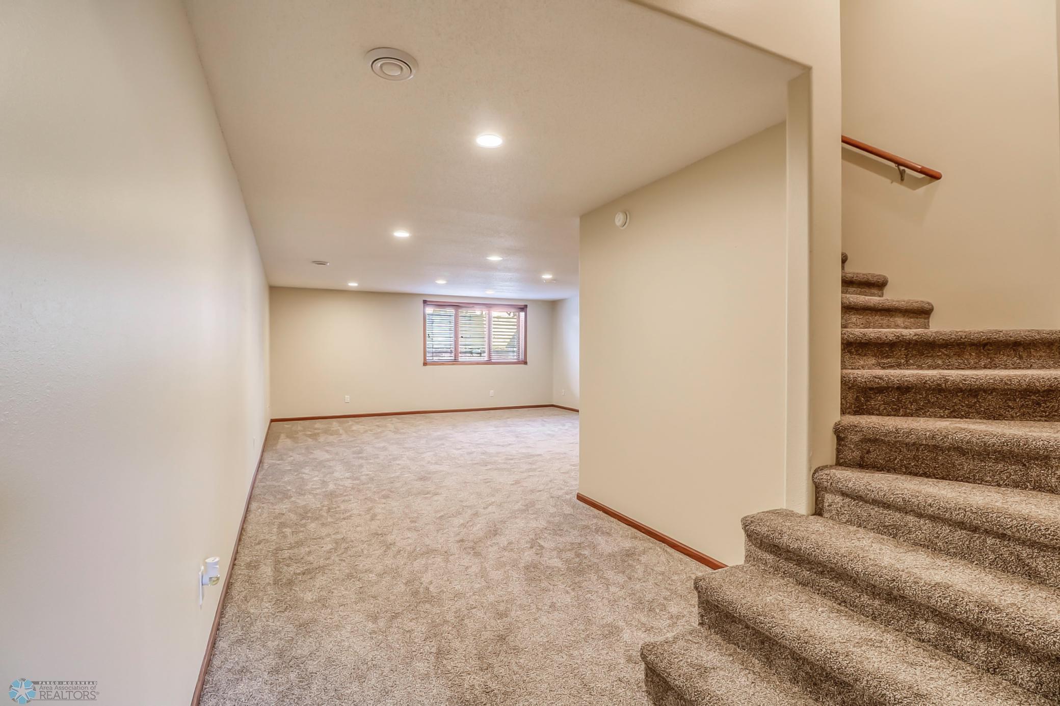 Basement Family Room - updated carpet, egress window. Great space!