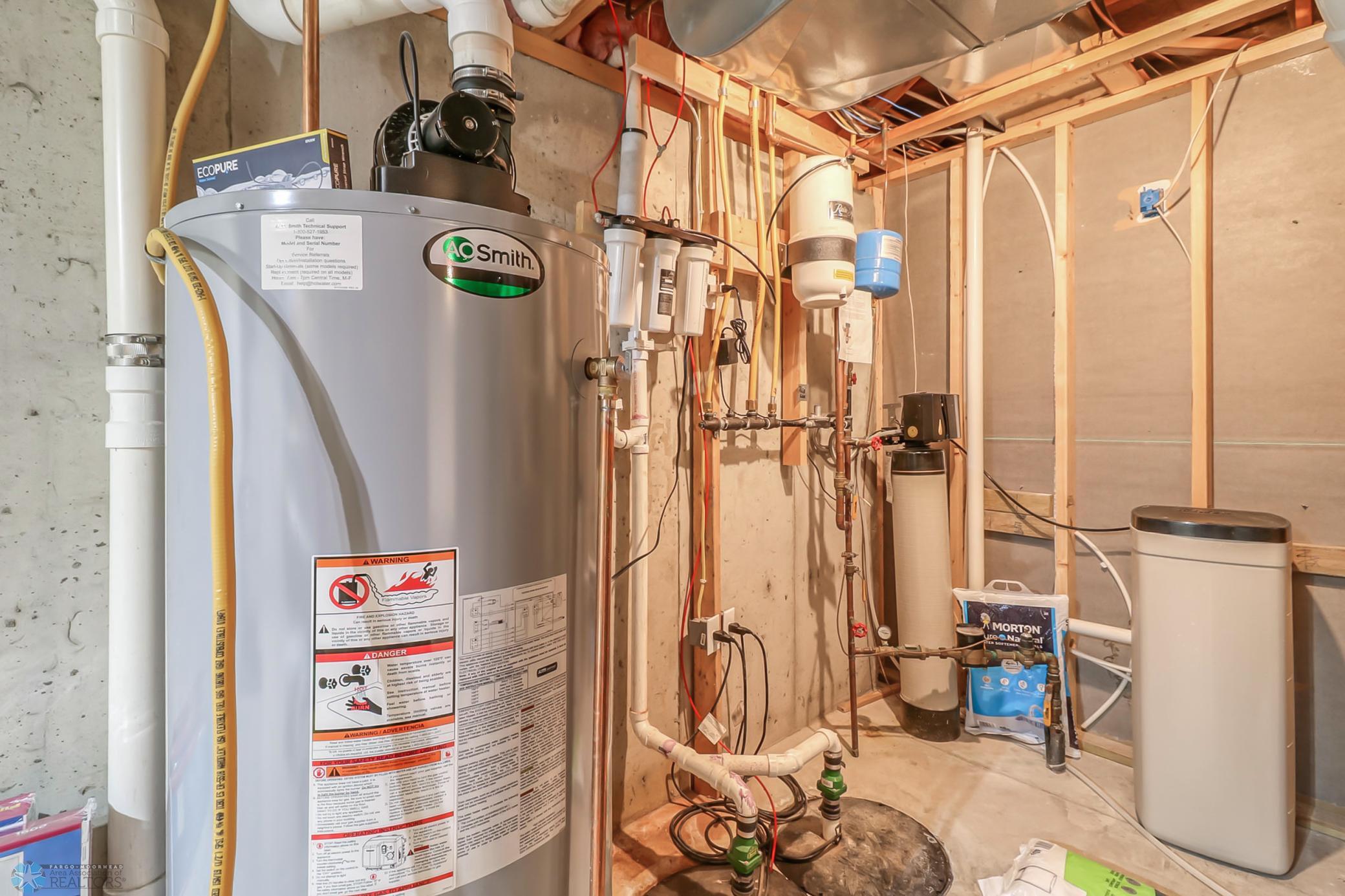 Mechanical Room - gas water heater, dual sump pumps, central vac and water softener.