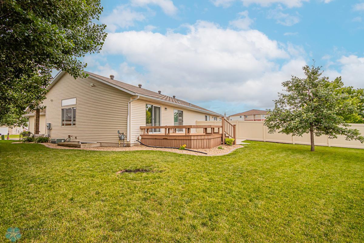 Nice sized partially fenced yard - your own private oasis!