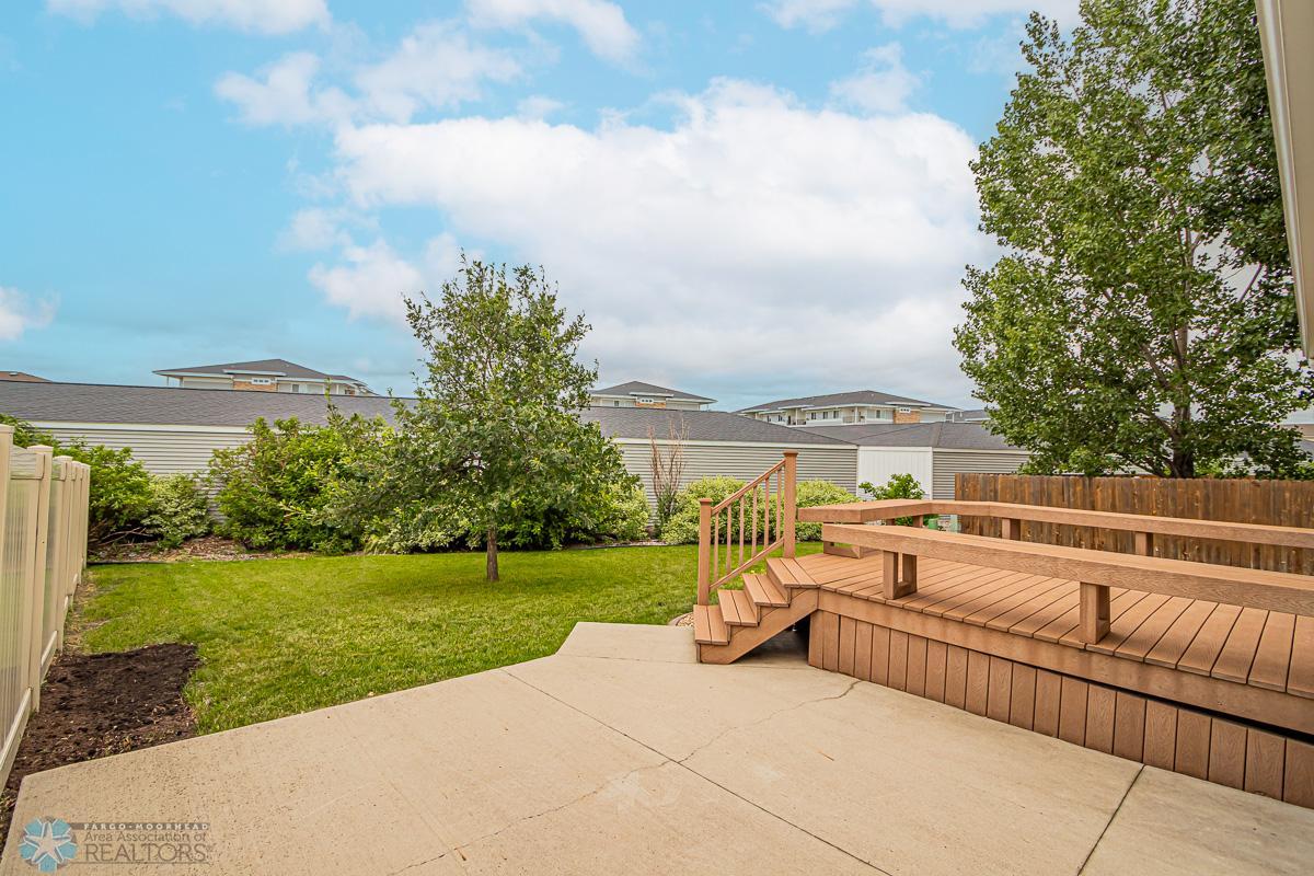 Patio plus Maint-free Deck in partially fenced yard