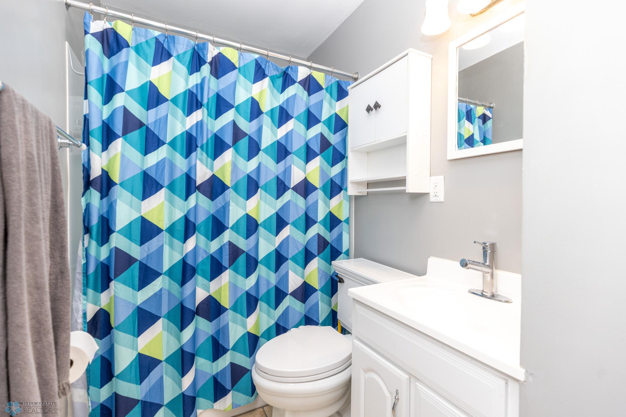 Full bathroom with bidet.