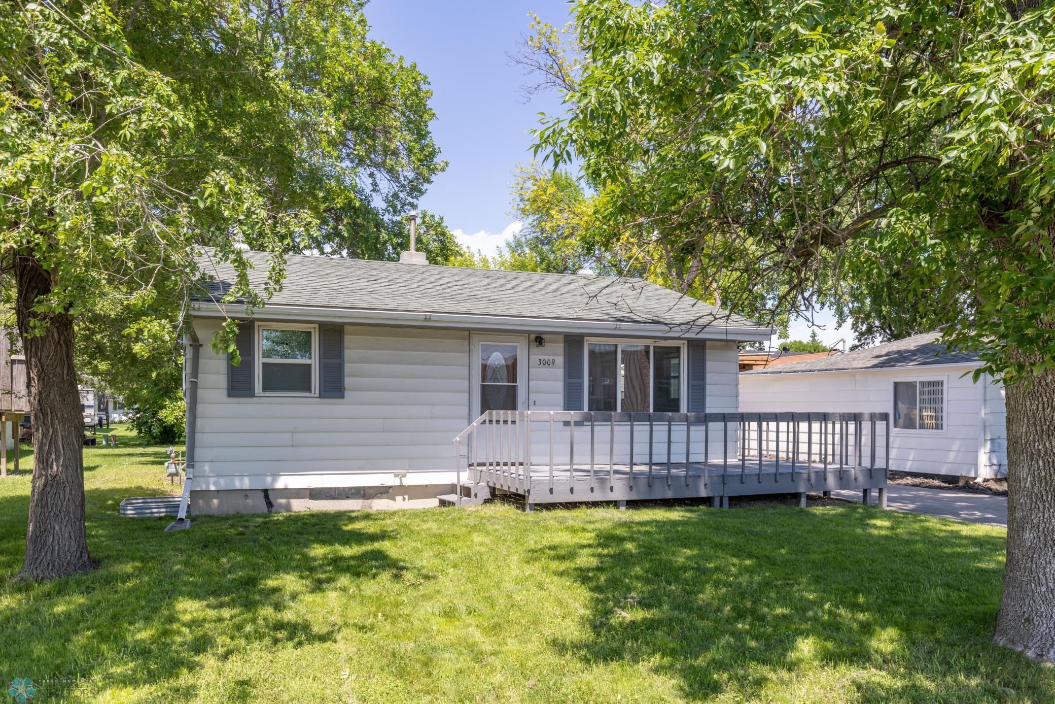 Beautiful Established trees throughout yard.