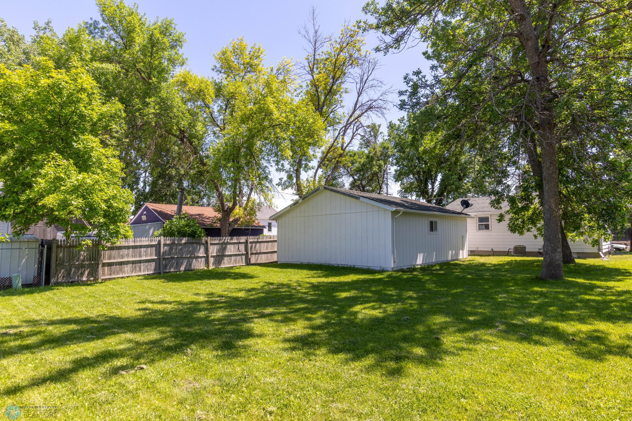 Partially fenced backyard