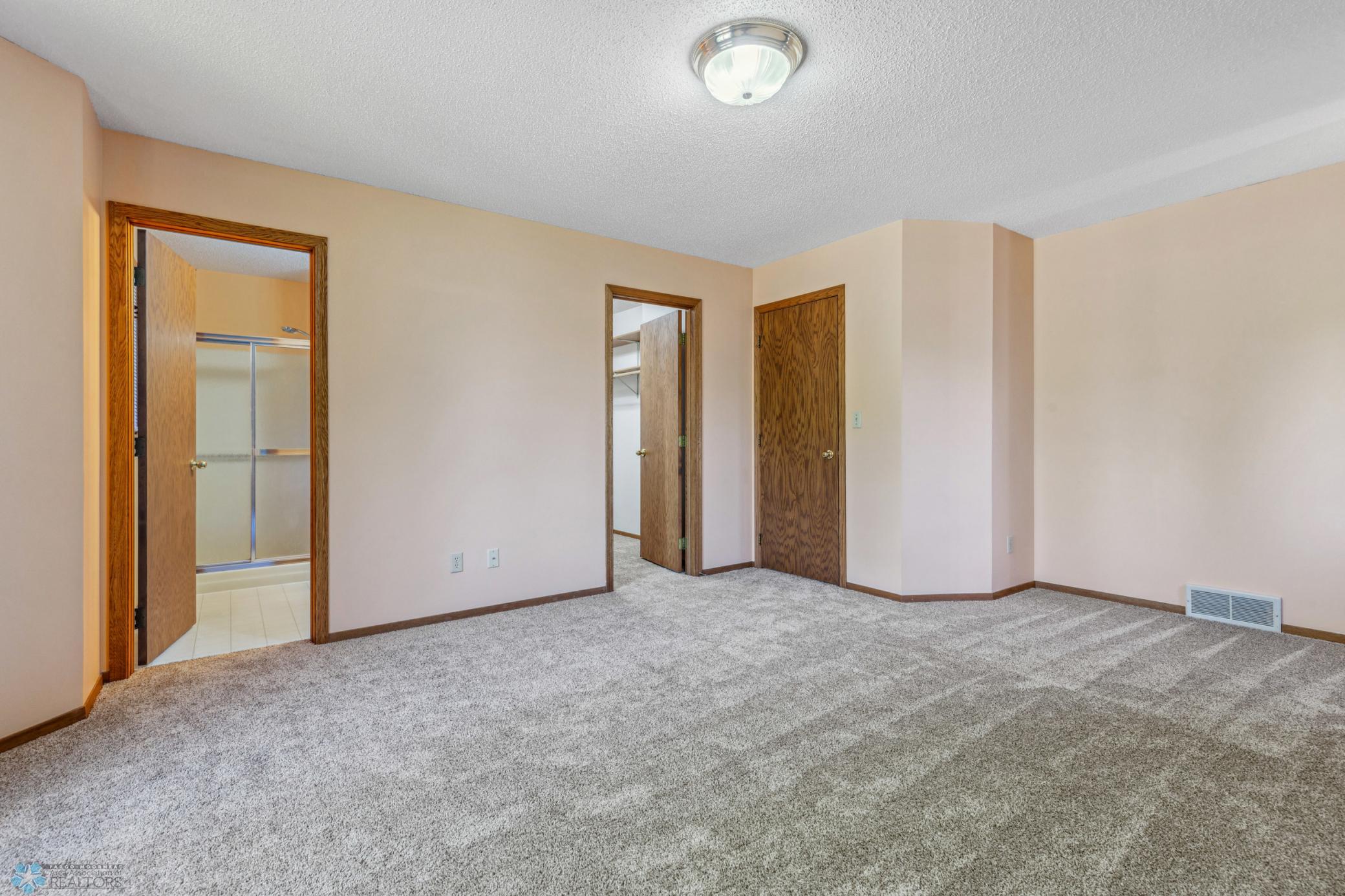 Primary Bedroom has 3/4 private bath and walk-in closet