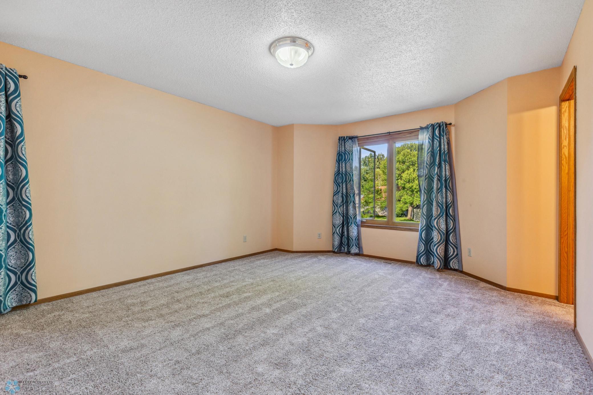 Primary Bedroom has 3/4 private bath and walk-in closet