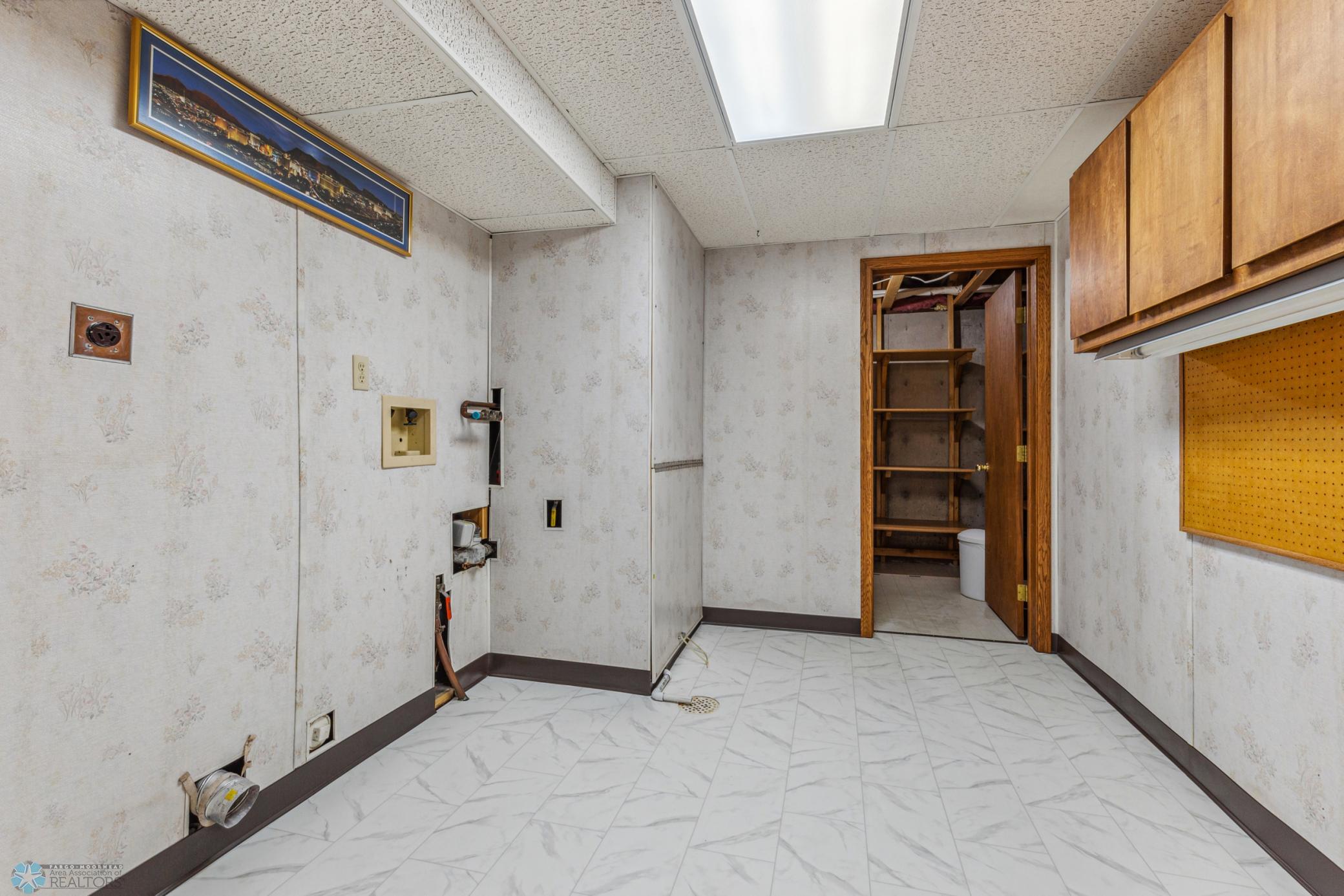 Laundry Room - New Flooring to Match Kitchen